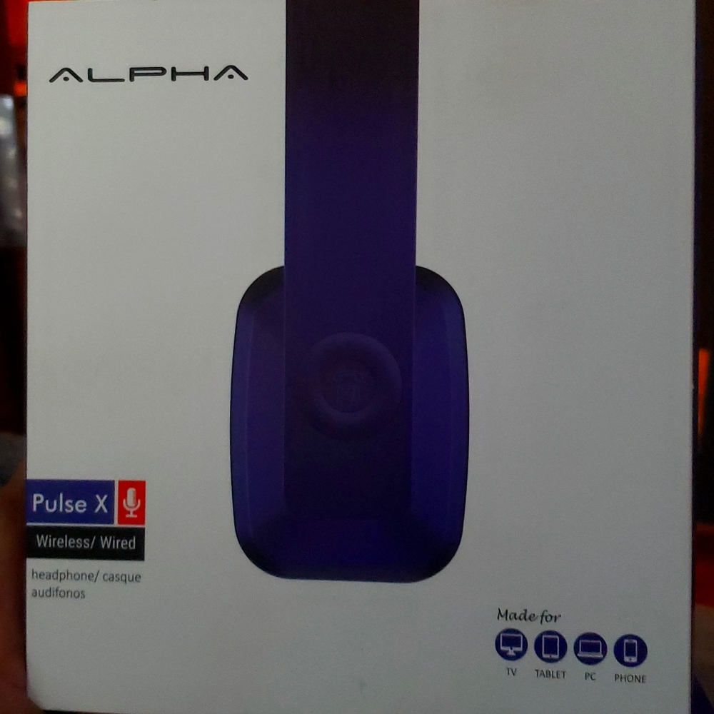 Alpha pulse X wireless headphones. Dark purple . Never used